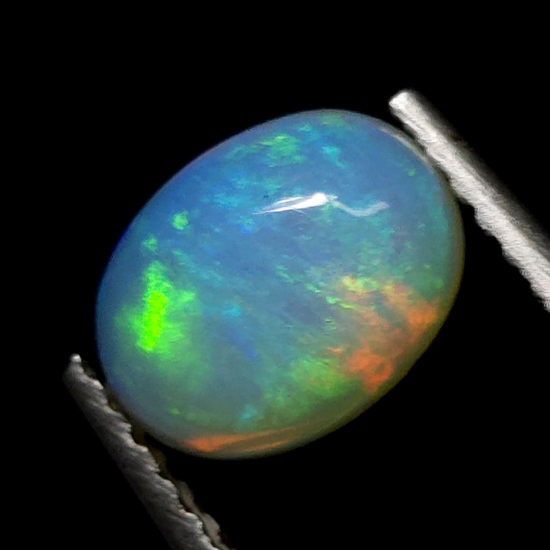 0.92 Ct Natural Ethiopian Fire Opal (1 of 5)