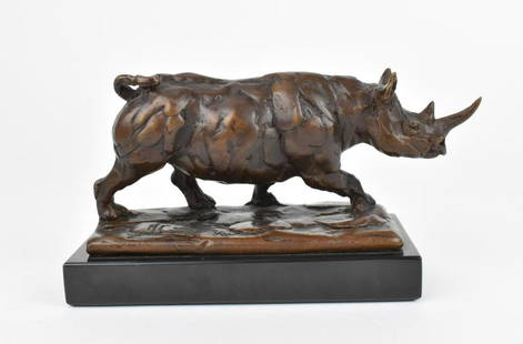 Mark Coreth (b. 1958) Britisha patinated bronze: Mark Coreth (b. 1958) Britisha patinated bronze naturalistic model of a rhinoceros, limited edition number 9 out of 21, on a rectangular black marble base, the figure 17 cm wide x 8 cm high