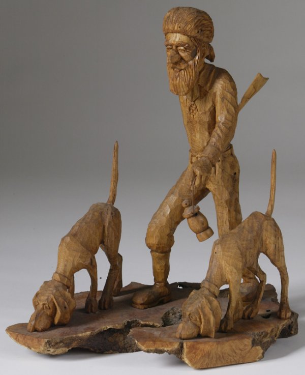 1064 Tom Wolfe (20th C.) Carved Wood Hunter