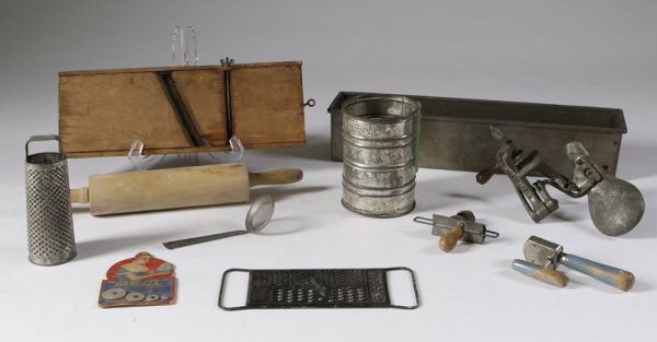 Large Collection Of 10 Kitchen Related Articles: Including a Pillsbury bread ban, two peelers, three sifters, two graters, a rolling pin, and a slicer. Wear consistent age and normal use.