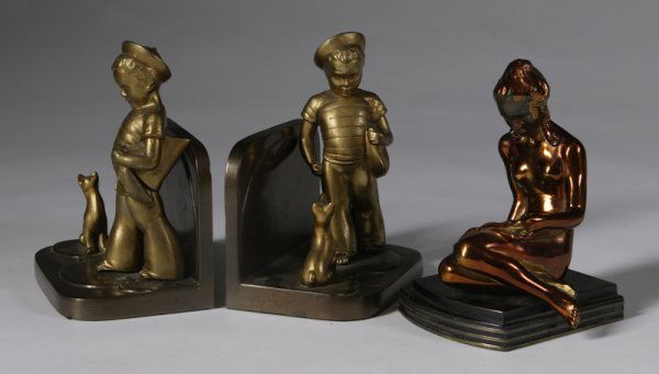 Three 1930s Spelter Bookends: Includes a pair of signed Frankart ends, modeled as a young boy with pond sailor and dog, measures 6-3/4" H, the other is dated 1937 and signed Art Metal Works and is modeled as a copper-plated young