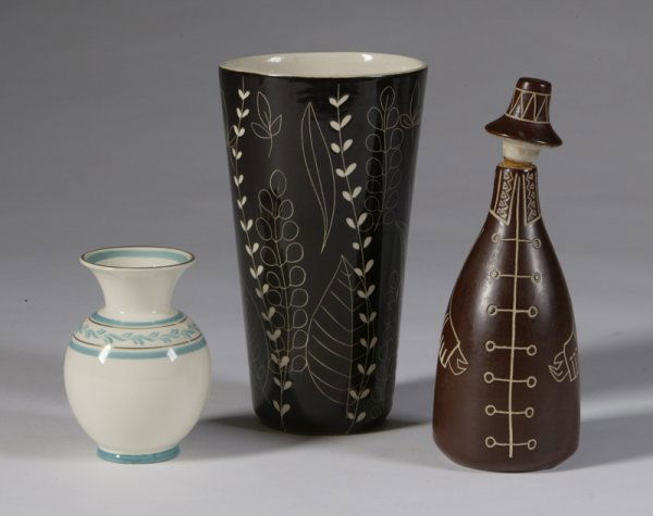 Ca. 1950's Finnish Pottery Table Articles: Includes a tall tapered vase with floral decorations, 8-1/4" H, signed Arabia, Finland underneath (No damage); 8-1/2" H Stopper decanter modeled as a Man with Coat and Hat, signed Arabia Finland under
