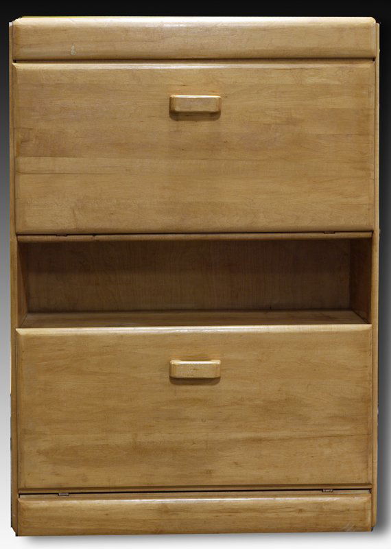 Russel Wright Oak Secretary: Circa 1950's and made by the Conant-Ball Company, secretary stands upright with open top for storage, desk opening to reveal slots and a single drawer and bottom opening to reveal two shelves. Most of