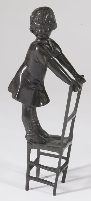 20th C. Bronze of a Girl Standing on a Chair: Done in the manner of Juan Clara, intricately molded in great detail. Depicts a female child standing up on a chair seat. 11" H x 2.5" W x 4.5" D. Slight wear to patina.