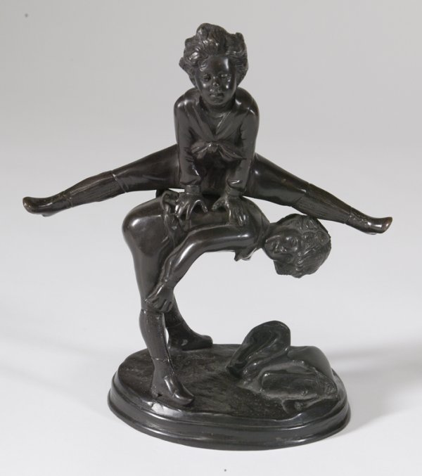 20th C. Bronze Sculpture of Boys Playing: Nicely detailed young boy jumping over on the back of another boy on a oval shaped base, unsigned, 10" H x 7" W. Great condition.