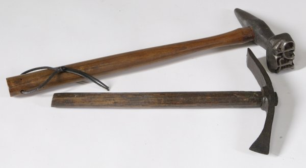 Antique Twibble and Log Marker: Both with wooden handles. The twibble has a cast iron blade and the log marker has a heavy metal monogrammed branding end. Wear consistent with age and use.