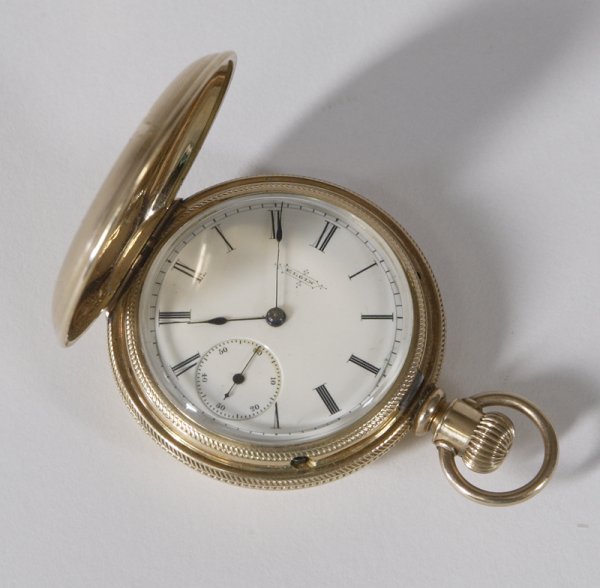 Elgin Gold Pocket Watch #36311: Etched house in a floral and leaf patterns on the bottom case and floral and leaf designs on the top case, Roman numeral dial with secondary dial, 1.5" Dia. Minor surface scratches on the inner top ca