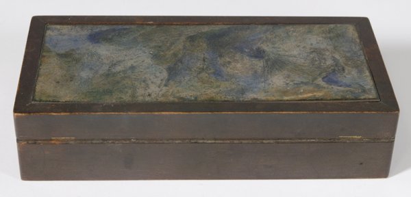 June Schwarcz Enameled Wood Box: Circa 1960's, enameled etched and painted inlaid top with leaf decorations set in walnut wood box humidor with 2 interior compartments. 2" H x 8" W x 4" D; signed on bottom. Minor surface scratches on