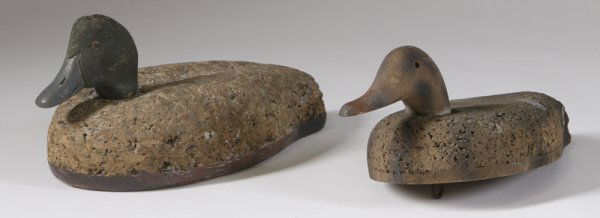2 Vintage Cork Form LL Bean Mallard Duck Decoy: Each with intricately carved wood heads with a larger one that has inset glass eyes and has impressed mark G.F.Pines, 7.5"H x 14.5"W, together with s a smaller decoy that has one inset glass eye and m