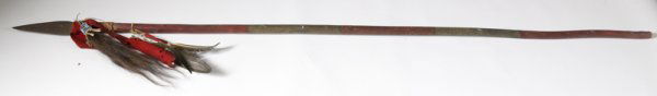 Plains Indian Lance: Leaf shape steel spear point. Decorated with red trade cloth, 3 feathers and beaded horse hair drop. 81" L.