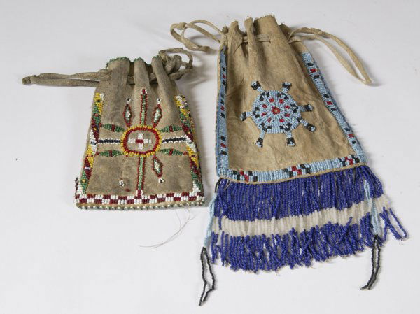 2 Beaded Apache Bags: First is beaded on both sides in red, yellow, white and other various colors; 6". The second is beaded mainly in light blue and blue; 11" (with fringe).