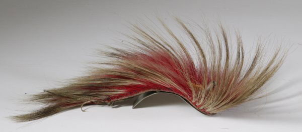 Indian Roach: Dyed hair in red and orange. Some minor hair loss consistent with age. 14" L