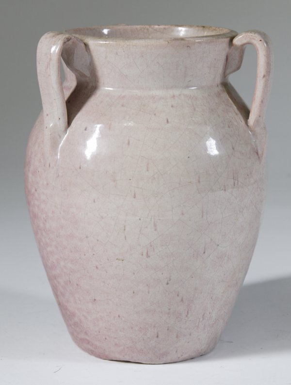 Circa 1930's 3-Handled Art Pottery Vase: Urn form with white and pink speckled ground, 10" H. Craquelure throughout the glazing and minor chipping along edges.