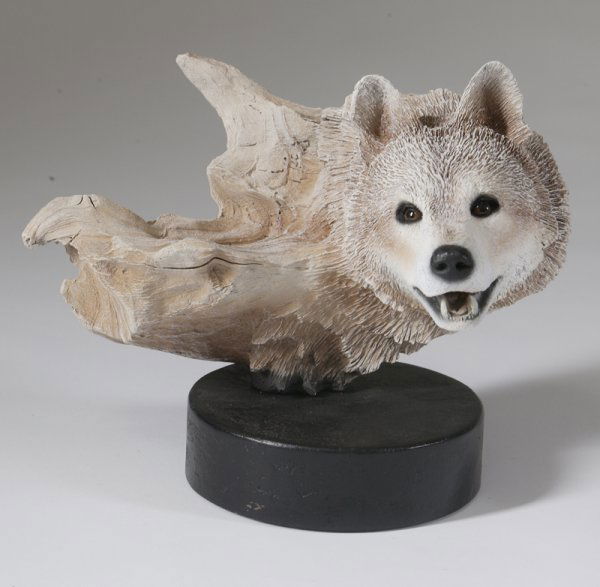 Rick Cain "Lone Hunter" Edit. 471/2000, Sculpture: Intricately painted composition wolf form with inset glass eyes mounted on round black base, signed and dated 1995 on the back and on label on bottom label, 9"H x 10"W x 7"H. Minor surface dirt good c