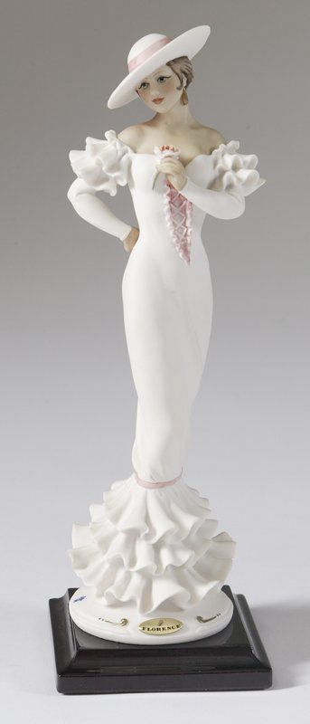 "Carmen" Gueseppe Armani Figurine: Intricately detailed, impressed signature C 1997 with blue N mark, mounted on stand with original box, 10"H x 3"W x 3"D. Mint condition.