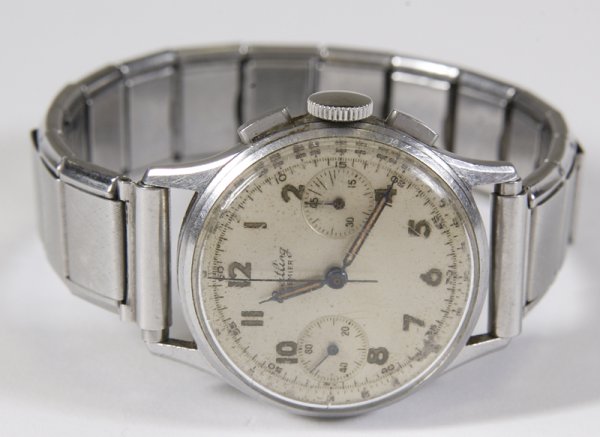 Vintage Men's Breitling Stainless Steel Watch: Circa 1940's-1950's. A fine stainless steel chronograph wristwatch. Case #69630078, 17 jewels-1155 111. Luminous Arabic numerals, luminous hands, outer five minute divisions and black tachometer scale