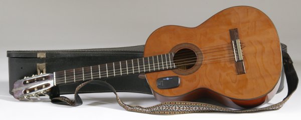 1969 Frederico Garcia Classical Guitar: Made in Madrid in 1969, guitar is made of rosewood back, sides, bridge and fingerboard. Comes with generic case and Dampitsinc.© sound hole cover. Plays and is in excellent condition.