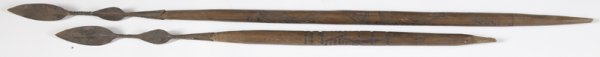 2 African Short Metal Tipped Spears w/Carved Shaft: Geometric carved shafts, spears with hand forged spear points, 36" and 26" respectively. Condition: Shows wear and use consistent with age.