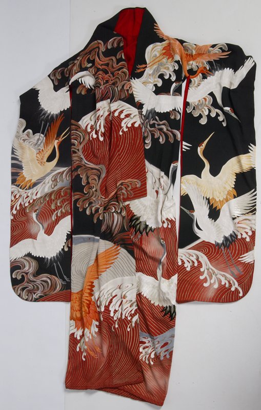Vintage Silk Kimono Robe: Long sleeves with outer in black and red and decorated with cranes and egrets. Interior is fire engine red, black and some of the outer. Measures 64" L x 24 " W (shoulder to shoulder). Area at sleeves