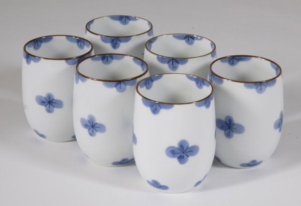 Set of 6 Chinese Floral Tea Cups: Each with blue flowers throughout and brown rim. 3.25" H, signed on bottom. Some staining to interior of a few cups. Estate of Meg Heinrich, Rochester Hills, MI.