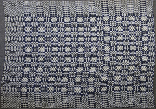 Fine American Blue & White Coverlet, Circa 1830: Blue and white geometric designs throughout. Measures 8' x 106". Excellent condition.