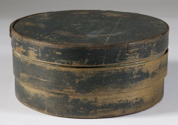 Exceptional and Large 19th C. Painted Pantry Box: Original green paint. Body with four finger lap joints. Staved constructed. 7" H x 14" Dia. Bottom finger with break, normal areas of paint loss and one band slightly loose. Overall a great box.