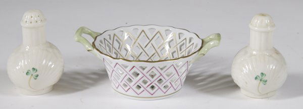 3 Porcelain Articles: Includes a Belleek shamrock and harp style pair of salt and pepper shakers, 3 & 1/8" H. And a pierced two handled basket by Herend Hungary, with bird decoration, 2 & 1/8" H x 4.25" Dia. Excellent cond