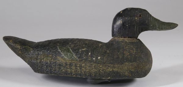 Antique R.P. Rother Jr. Duck Decoy: Carved and painted decoy in black over yellow and green with inset glass eyes. Attached weight on bottom and nameplate that reads, "R.P. Rother Jr. 2909 W. Stiles St. Phila, PA," which may riggers tag