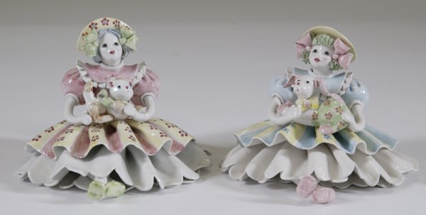 2 Made in Italy for Gumps Ceramic Clowns: Both seated girl clowns, one is holding a kitten and the other is holding a puppy. 4.75" H, excellent condition.