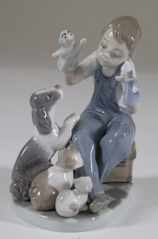 Lladro "Puppet Show" #5736: Issued in 1991 and retired in 1996. 6" H, mint condition.