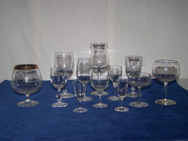 Large Lot Of Stemmed Glasses: Over Thirty mixed glasses including wine glasses, shot glasses, cordials etc. Fair used condition.
