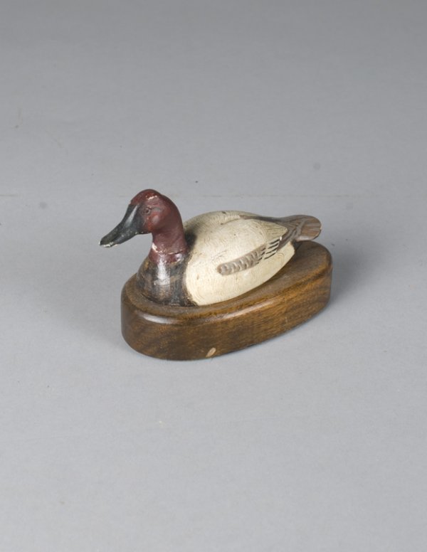 Jess Blackstone Miniature Duck Carving: Retains all of it's original paint, mounted on a walnut base. Neck with repaired break with small area of paint loss to front of neck easily restorable, 4.25"L, early 20thC.