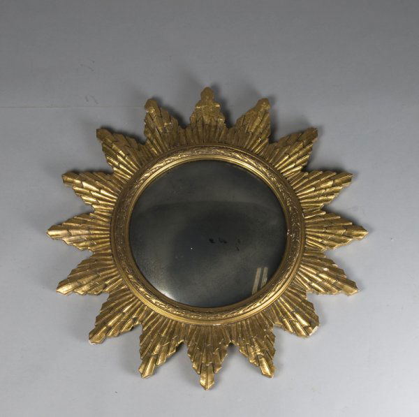 American Carved Giltwood Sunburst Mirror 19th C: With convex glass, carved to depict wheat. 27"D, 2 points with repair and touch up, loss to plate on mirror, some chipping to points, one with 1" loss. Circa 1850, nice old original mirror.