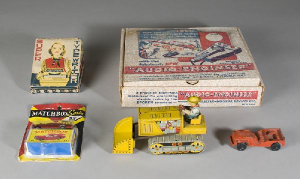 5 Vintage Toy Lot: Includes a boxed "Audio-Engineer," for trains, a boxed tin "Super Typewriter," a Line Mar Toys tin tractor, a 1964 Matchbox car, unopened, and a Tootsie Toys aluminum jeep.