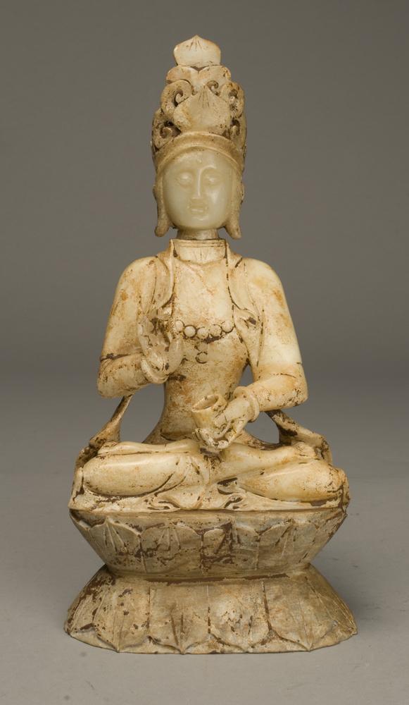 Fine Chinese Qing Jade Buddha: Seated in meditation holding a tea cup with other hand raised. The face of polished white to celadon tone, seated on a double lotus base. 12" H x 6" W. 19th C.