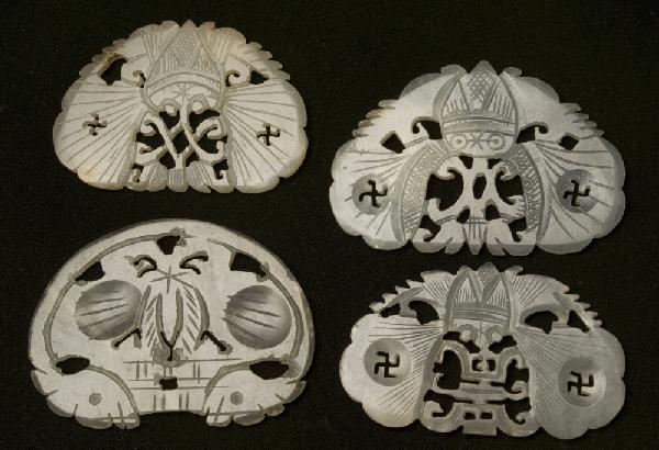 (4) Chinese Qing Carved Jade Bat Plaques: All finely carved and translucent jade. Includes jade depicting bat in half circle with two recessed dots etched with wings. And 3 jades depicting a bat with scrolling crown and pierced swastikas, var