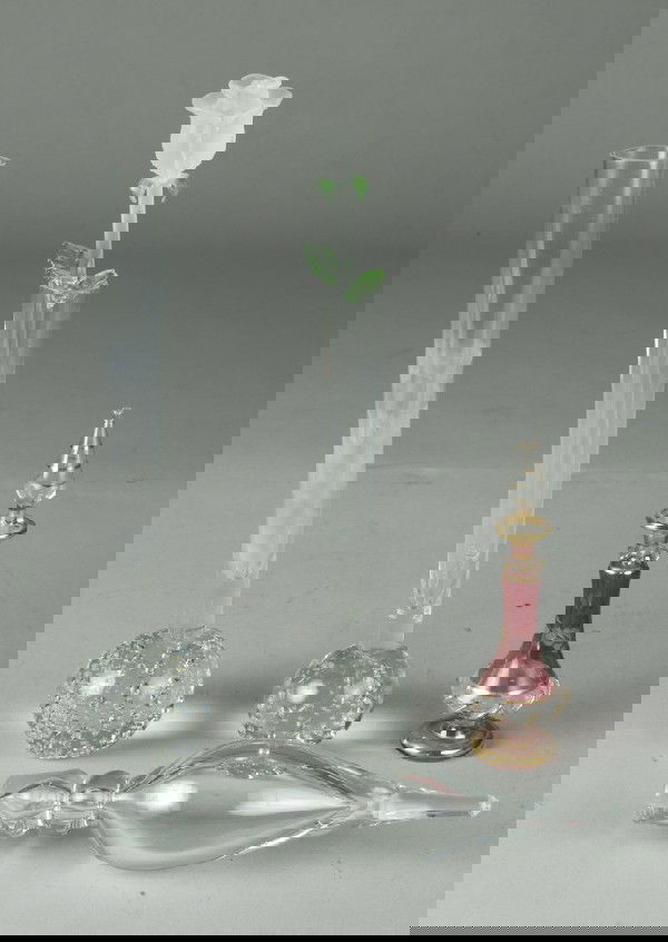 (5) Pieces of Fine Art Glass: Includes a pair of vases weighted at bottom, a frosted and green glass rose drink mixer, a clear glass stopper, and a boxed cranberry and gilt perfume bottle. Tallest 9.5" H.