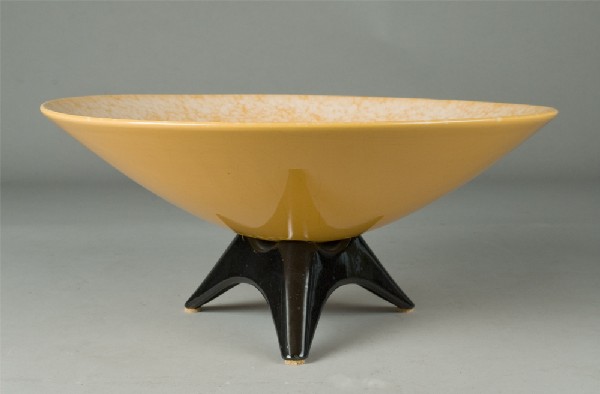 Vintage Royal Haeger Pottery Bowl: Large yellow bowl with crackle glaze and white clouding near edges, resting on a three footed black base. 6.25" H x 14" Dia., Royal Haeger mark, R1599 and USA on bottom. Excellent condition.