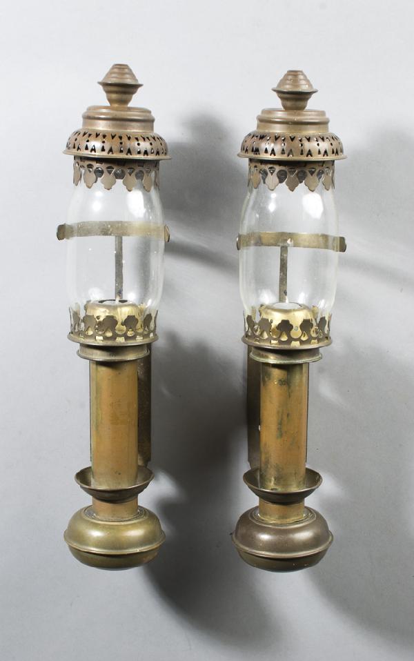 Pair of Antique Brass Wall Sconces: Removable bottom houses spring to push up for a candle. 13" L, some chips to rims of glass, and small hairline crack at base of one glass.