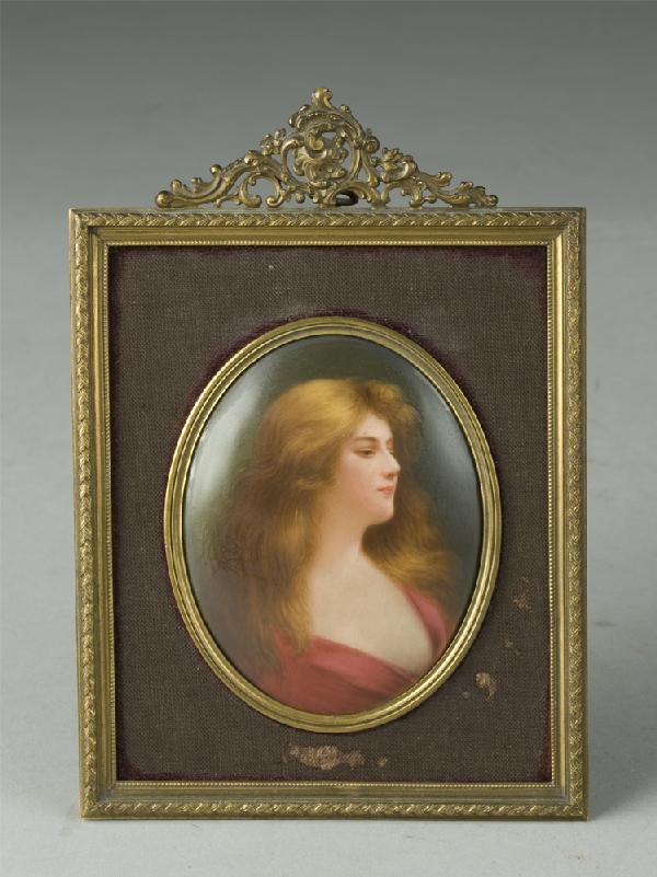 Style of Henner, Miniature Oil on Porcelain: Style of Jean Jacque Henner, 1829-1905, France. Finely painted to depict a portrait of lady in semi-profile, dressed in red, with long auburn hair. 3.25" H x 2.5" W, in frame and unsigned. 19th Centur