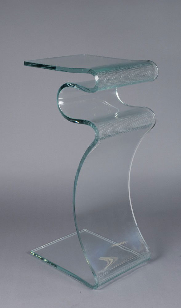 Large Slumped Glass Pedestal by Laurel Fyfe: Thick glass with cast texture and light hazing in the tightest curves. Laurel Fyfe founder of Fox Fire Glass in Pontiac Michigan has done many major commission works including, the sand carved glass p