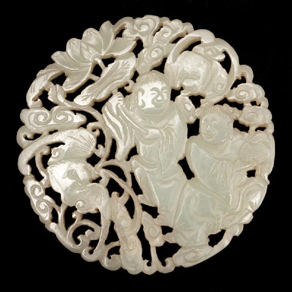 Large Chinese Qing Carved Jade Plaque: Finely carved on both sides to depict scholars and bats with openwork carvings. The jade a medium celadon tone. 3.25" Dia. Very nicely done. Circa 18th/19th Century.