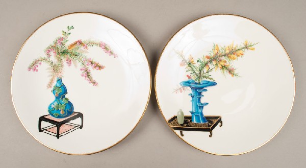 (2) Fine Minton's Porcelain Plates: Both decorated in the Chinese taste, one finely enameled to depict a gourd vase with apple blossoms on a lacquered, the rim richly gilded with zig-zag pattern. The second plate finely enameled to depi