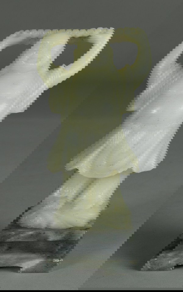 Chinese Soapstone Carved Buddha: Finely carved depicting a happy Buddha with necklace outstretched over his head, on a stand, and again on a pedestal. 6.5" H, sticker on bottom with signature and Made in the Peoples Republic of China