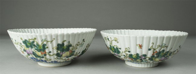 Pr. Of Chinese Porcelain Bowls: Both in scalloped edge and shell design, exterior decorated with bamboo trees and various colored flowers. Interior decorated with three Koi amid seaweed. 3.25" H x 8.25" Dia. Four character signature