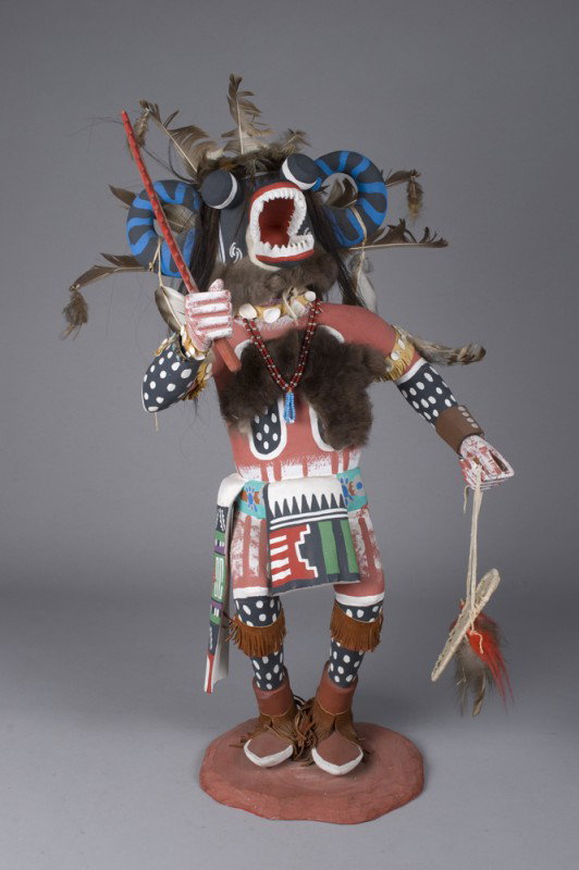 Large & Exceptional Katchina 31" Tall: Wonderfully painted, with war shield. Beaded necklace, silver and turquoise bracelets, and feathered headpiece, mounted to carved base. 31"H x 16"W, just a wonderful piece circa 1960.