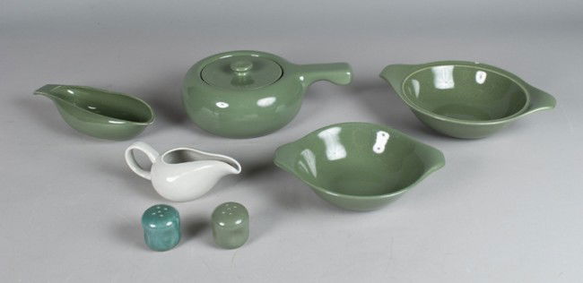 (6) Russel Wright Tableware Pieces: Includes a green covered vegetable, 2 green handled bowls, a green handled bowl, a green shaker, and a gray gravy boat. All in good condition.