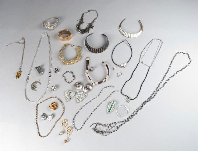 Collection of Costume Jewelry: Includes Trifari clip-on earrings, necklaces, bracelets and more.