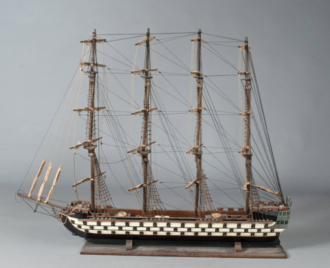Very Fine Wood Model of a Spanish Fragata: The four masted ship with 45 side mounted cannons in iron, wood, canvas and string. Very intricately done, mounted on a wood display stand with title plaque (fragata Espanola siglo XVIII). 39" W x 31"
