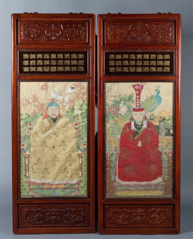 Pr. Of Chinese Ancestral Portraits: The gentleman in a yellow dragon robe amongst foliage with two white doves, the lady fully robed in red with elaborate head piece amongst foliage and a peacock, both seated on thrones both mounted in 